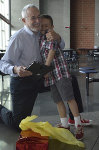 Mike's "life coach," Travis VanSetters, taught him the wisdom of wearing red tennis shoes